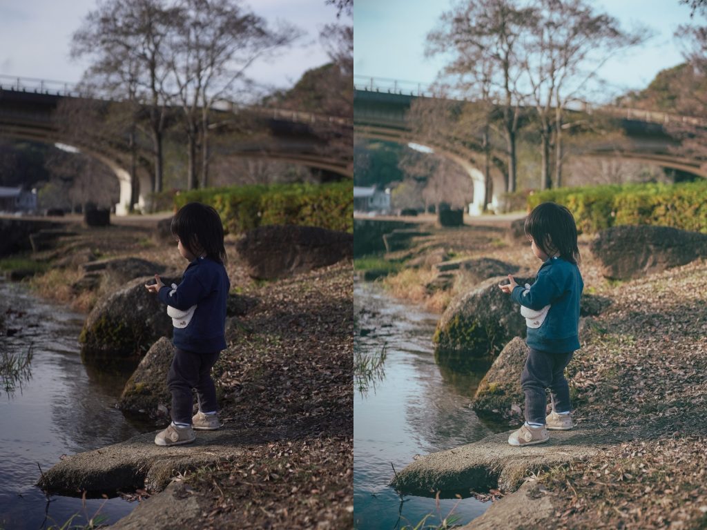 川のほとりに立つ子供